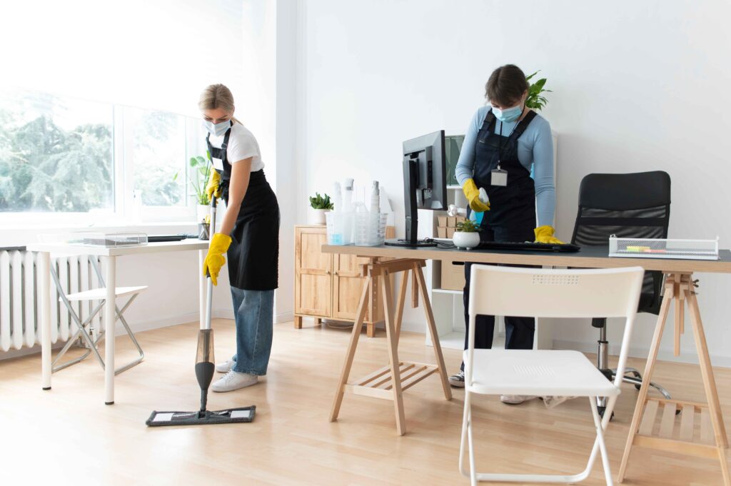 people taking care office cleaning